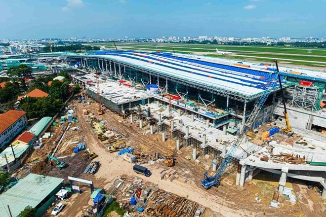 Cận cảnh đại công trường nhà ga sân bay lớn bậc nhất Việt Nam đang 'chạy nước rút' về đích đúng dịp đặc biệt của đất nước- Ảnh 4. Cận cảnh đại công trường nhà ga sân bay lớn bậc nhất Việt Nam đang 'chạy nước rút' về đích đúng dịp đặc biệt của đất nước- Ảnh 4.